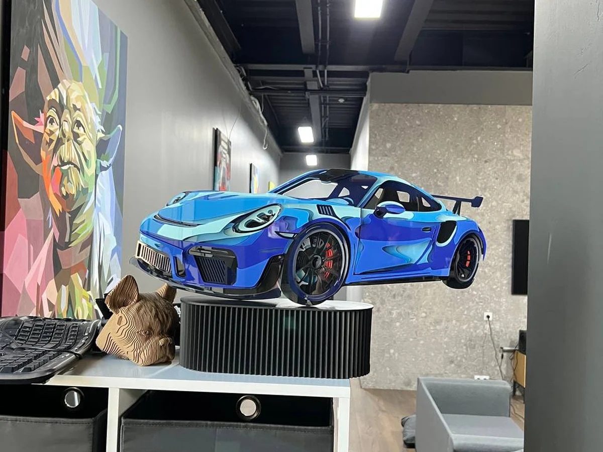 Blue StackRise model on a shelf in a loft space